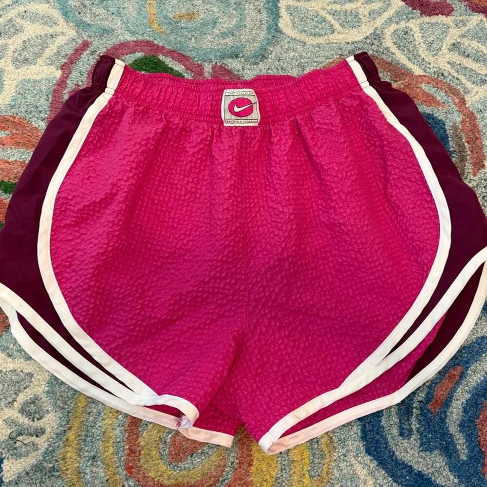 Nike pink running shorts with